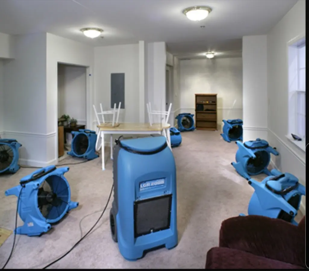 Air movers and dehumidifier setup for Water Damage Restoration in Kemp Mill